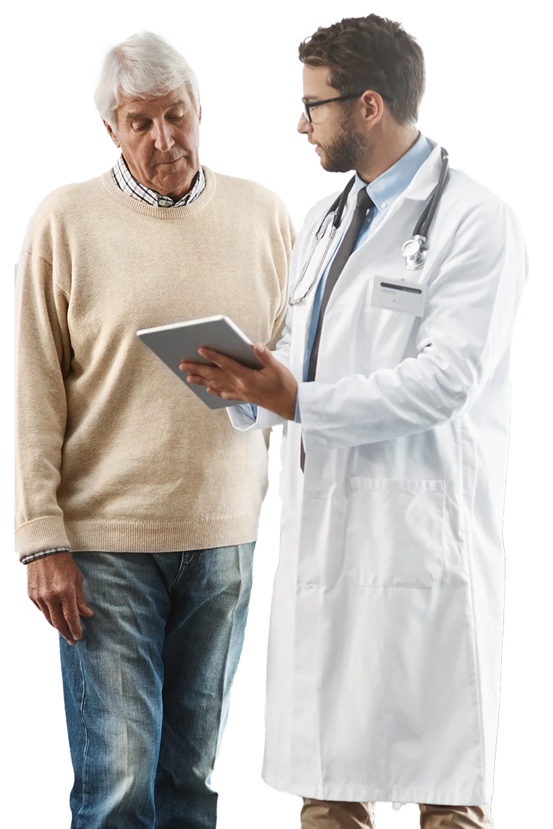 A doctor explaining information on a tablet to an older adult during a consultation